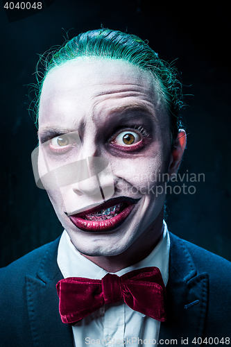 Image of Bloody Halloween theme: crazy joker face