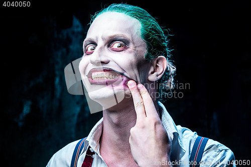 Image of Bloody Halloween theme: crazy joker face