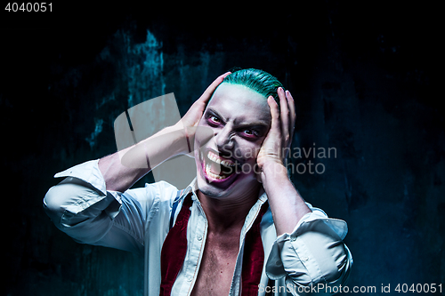 Image of Bloody Halloween theme: crazy joker face