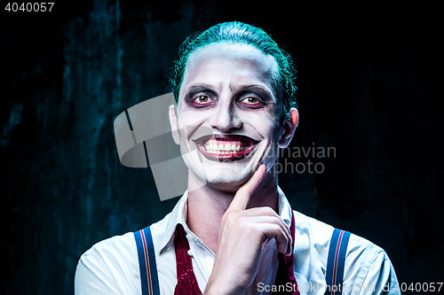 Image of Bloody Halloween theme: crazy joker face