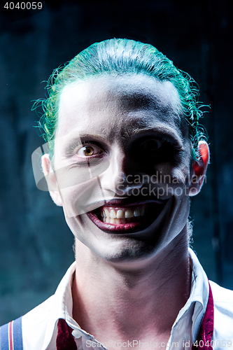 Image of Bloody Halloween theme: crazy joker face