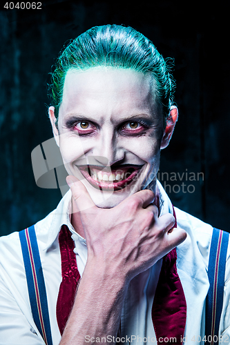 Image of Bloody Halloween theme: crazy joker face