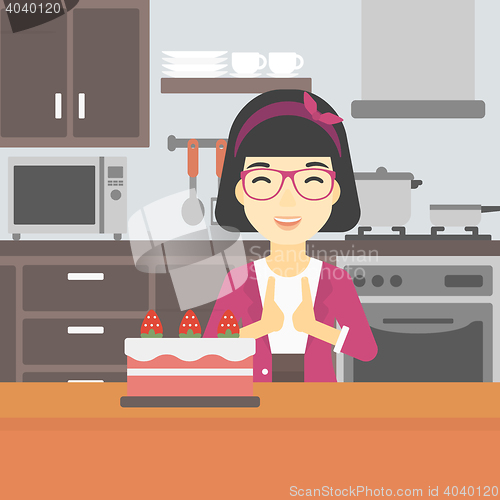 Image of Woman looking at cake with temptation.