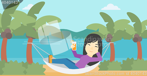 Image of Woman chilling in hammock.