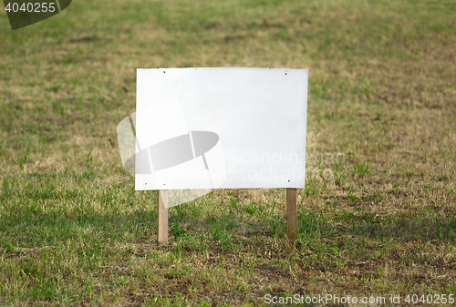 Image of Empty sign on a land