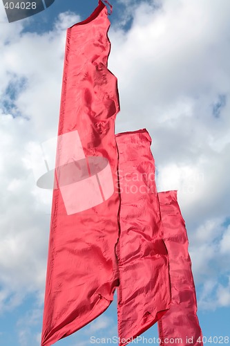 Image of brightly red flags