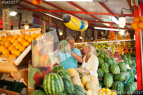 Image of Elderly couple in market