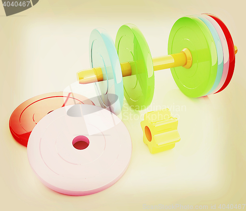 Image of Colorful dumbbells are assembly and disassembly on a white backg