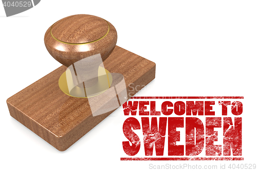 Image of Red rubber stamp with welcome to Sweden