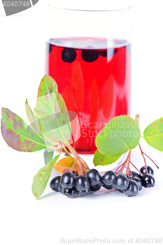 Image of Glass of aronia juice with berries