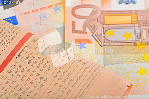 Image of Close-up newspaper with of Euro banknotes