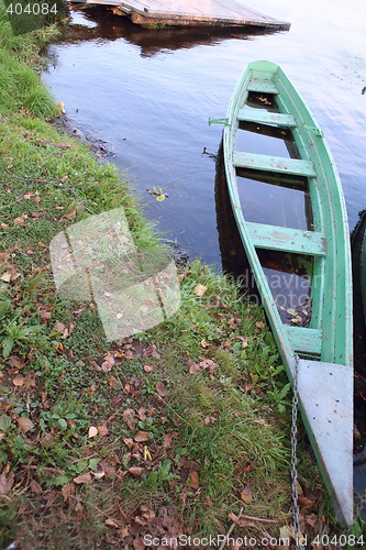 Image of old green boat