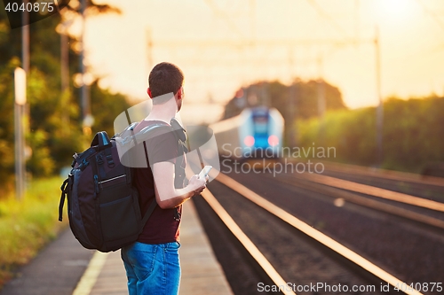 Image of Traveler at the sunset