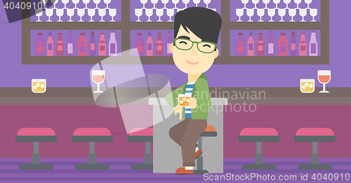 Image of Man sitting at the bar counter.