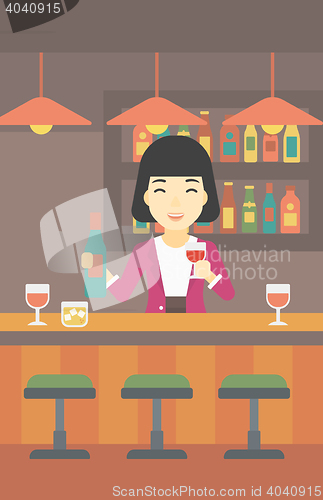 Image of Bartender standing at the bar counter.