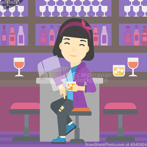 Image of Woman sitting at the bar counter.