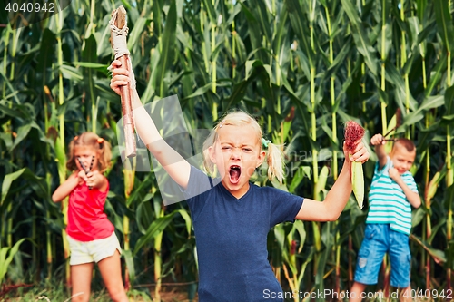 Image of Mischievous girls and boy