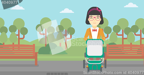 Image of Mother walking with baby stroller.