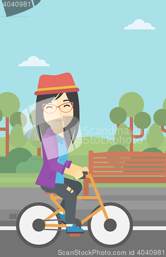 Image of Woman riding bicycle vector illustration.