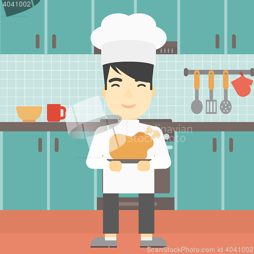 Image of Chief cooker holding roasted chicken.