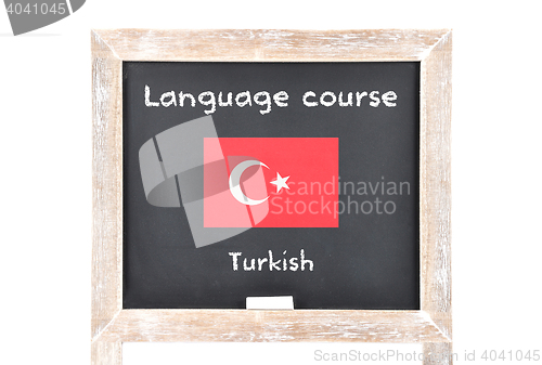 Image of Language course with flag on board