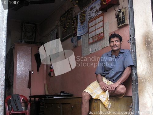 Image of Streets of Kolkata. notary sitting in his office