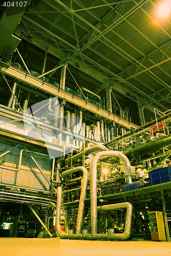 Image of Equipment, cables and piping as found inside of a modern industr