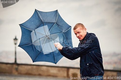 Image of Man in rainy day