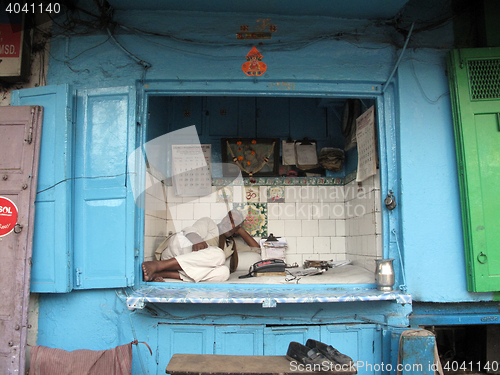 Image of Streets of Kolkata. notary sitting in his office and waits for a customer