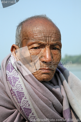 Image of Portrait of a day laborer in Kumrokhali, West Bengal, India