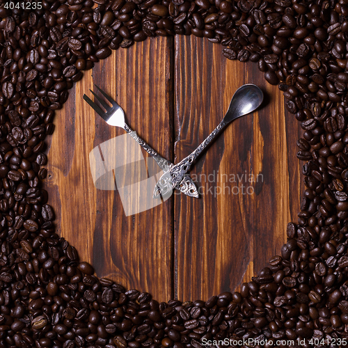 Image of Spoons with coffee