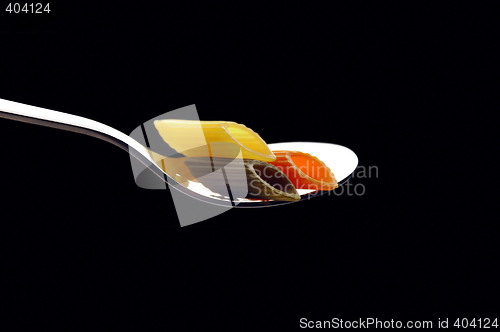 Image of italian penne pasta on a spoon