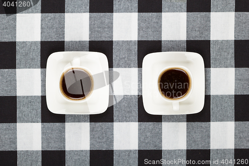 Image of Coffee cups and saucer