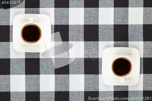 Image of Coffee cups and saucer