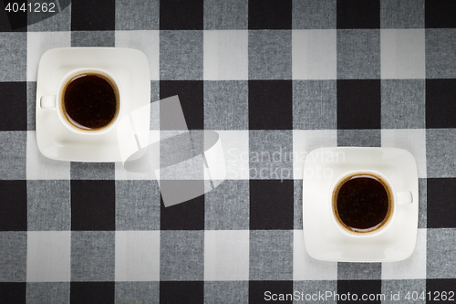 Image of Coffee cups and saucer