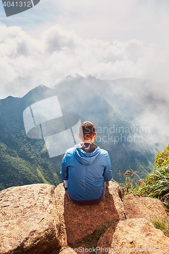 Image of Tourist in mountains