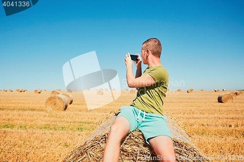 Image of Young man on the cornfield