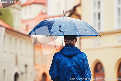 Image of Man in rainy day