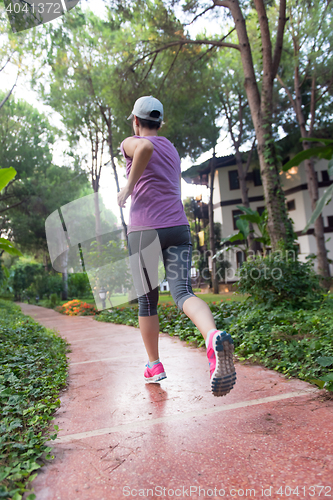 Image of sporty woman jogging