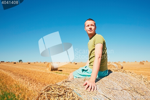 Image of Young man on the cornfield