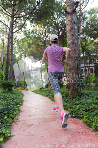 Image of sporty woman jogging