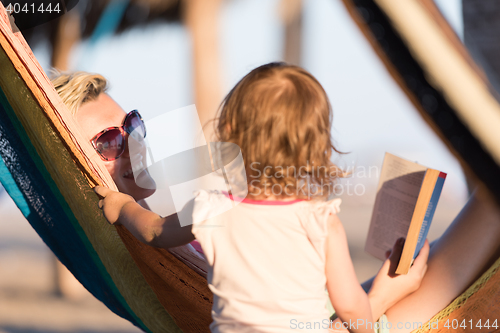 Image of relaxed woman laying in hammock