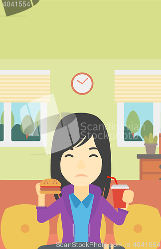 Image of Woman eating hamburger vector illustration.