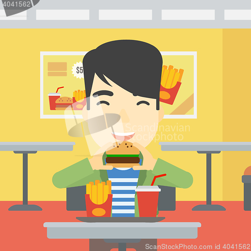 Image of Man eating hamburger vector illustration.