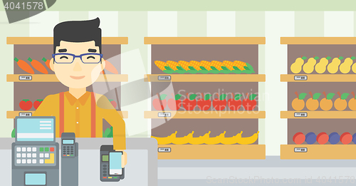 Image of Customer paying wireless with smartphone.