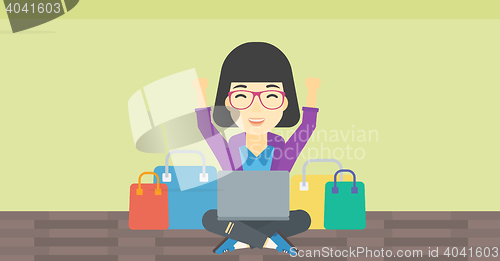 Image of Woman shopping online using her laptop.