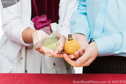 Image of Children holding christmas dessert