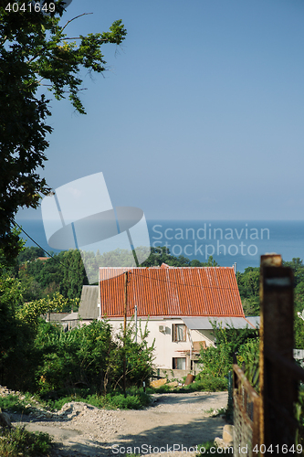 Image of Rural house in countryside against of sea