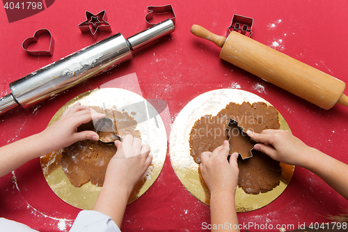 Image of Children making christmas gingerbread