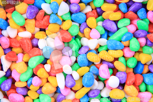 Image of boulders with plastic colors 